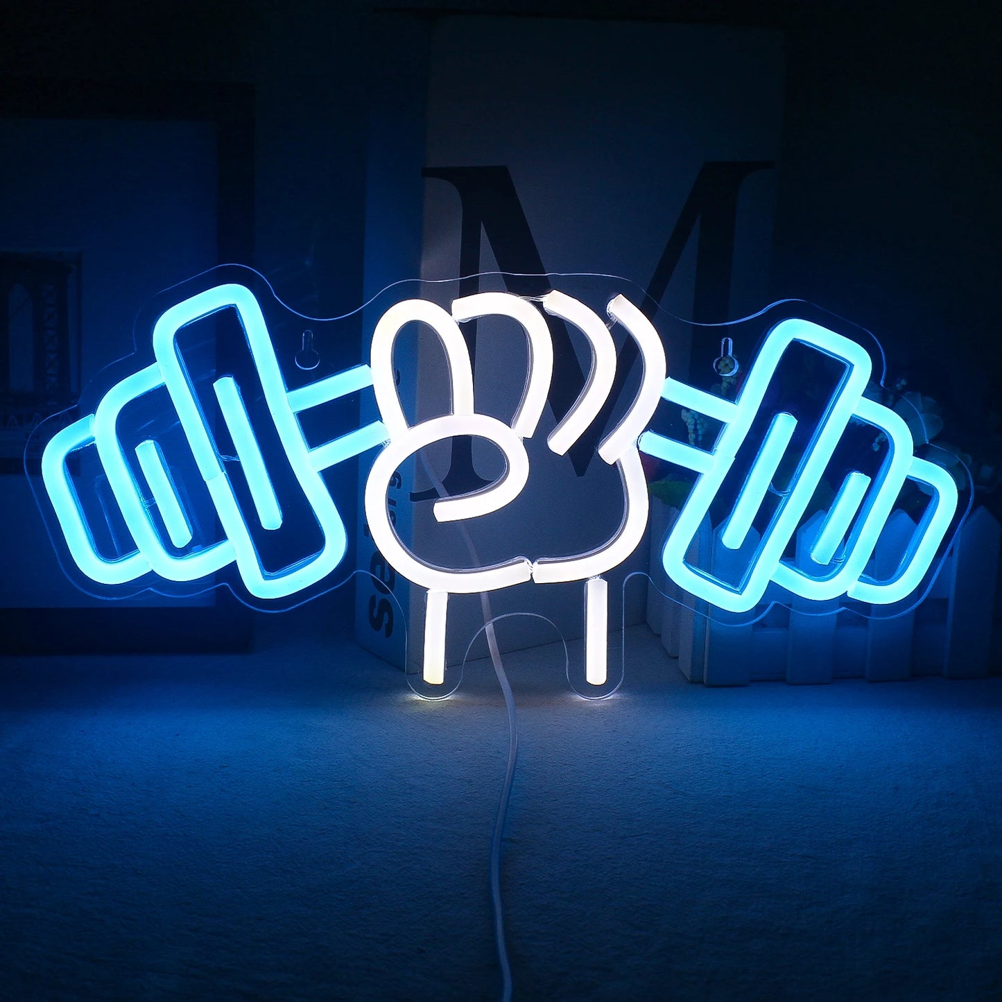 Das Bild zeigt ein leuchtendes LED-Neonschild in Form eines Hantel-Gewichthebermotivs.