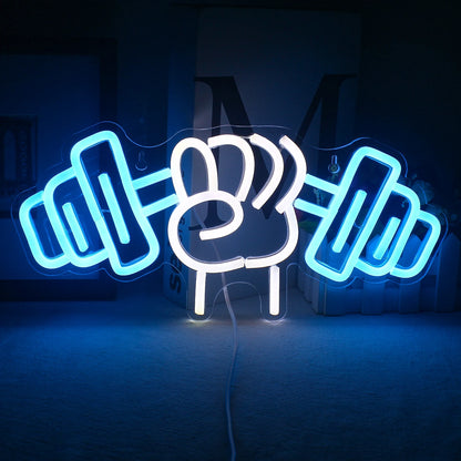 Das Bild zeigt ein leuchtendes LED-Neonschild in Form eines Hantel-Gewichthebermotivs.