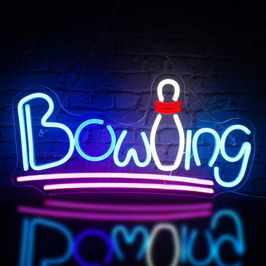 The image features a vibrant LED neon sign shaped like a bowling pin and bowling ball.