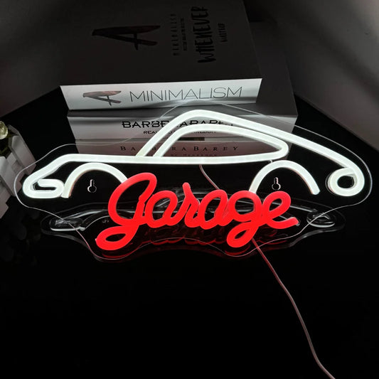 The image features a vibrant LED neon sign displaying the word "Garage" in a bold and stylish font.