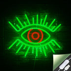 Das Bild zeigt ein leuchtendes LED-Neonschild in Form eines Augenpaars.