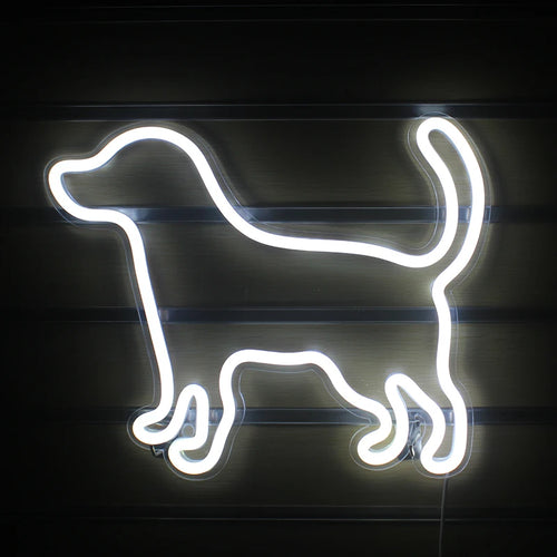 Ein leuchtendes LED-Neonschild in Form eines kleinen, verspielten Hundes.