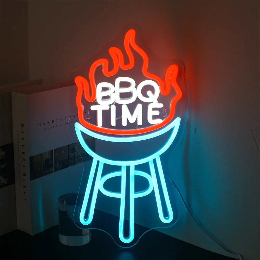 A vibrant LED neon sign displaying "BBQ Time" in a playful cursive font.