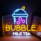 Das Bild zeigt ein leuchtendes LED-Neonschild in Form einer Bubble-Milch-Teetasse.