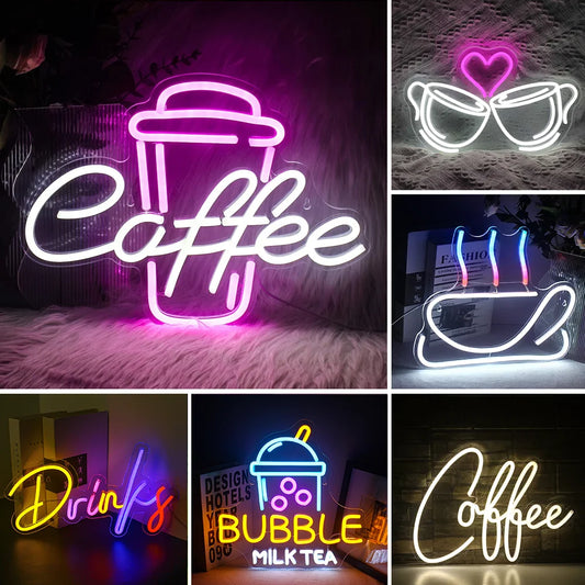 A vibrant LED neon sign shaped like a steaming coffee cup, glowing with warm shades of yellow and orange.