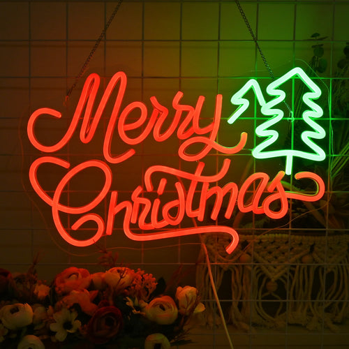 Ein leuchtendes LED-Neonschild in Form eines Weihnachtsbaums, das in mehreren Grüntönen leuchtet.