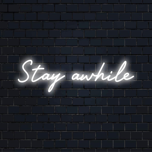 Bespoke Stay Awhile LED neon, merging word art and light decor; transforms any space with its inviting glow.