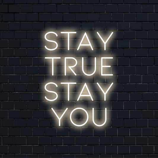 Custom-made LED neon sign featuring Stay True Stay You; perfect for personal mantra decor with unique glowing ambience.