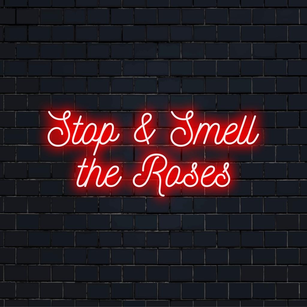 Individuelles LED-Neonschild mit dem Spruch „Stop And Smell The Roses“; perfekte Neonlichtdekoration für jeden Raum.