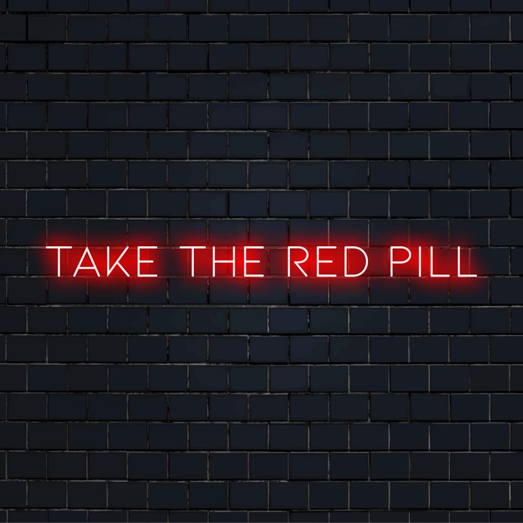 LED neon sign displaying the phrase Take The Red Pill in vibrant, eye-catching light. Perfect for modern wall decor.