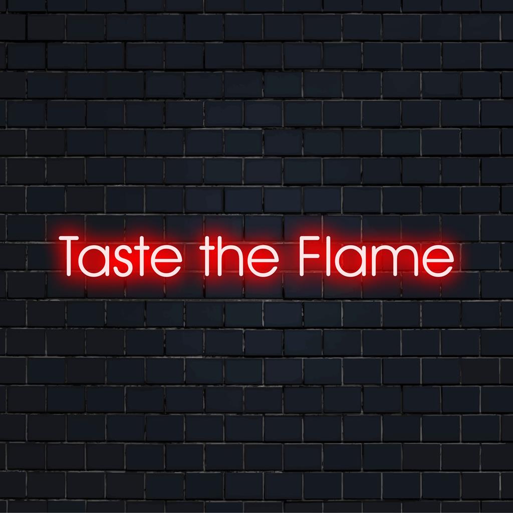 Das leuchtende, individuell angefertigte LED-Neonschild mit der Aufschrift „Taste The Flame“ strahlt feurige Energie aus und ist perfekt für dynamische Räume.