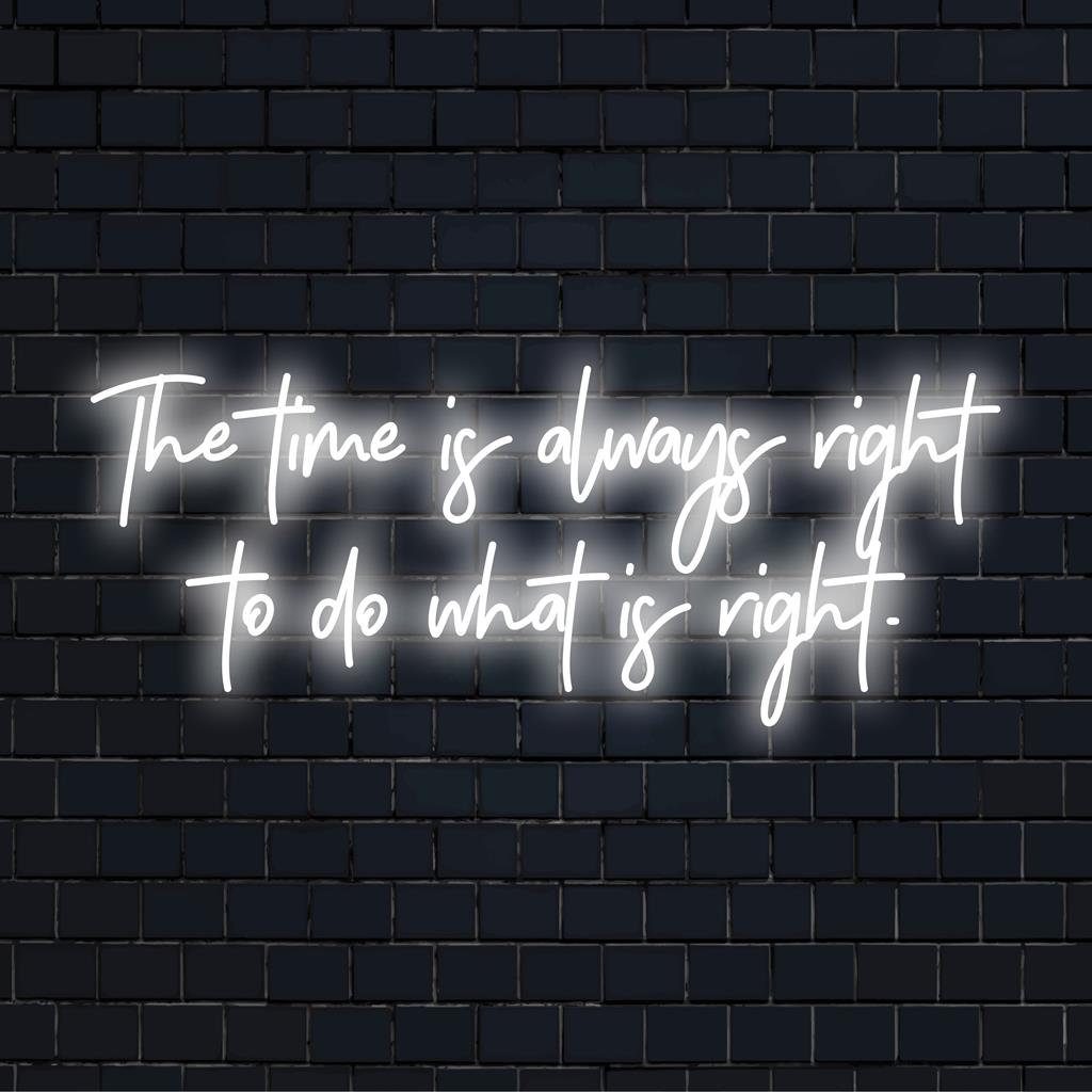 A custom made LED neon sign that reads The Time Is Always Right To Do What Is Right, perfect for vibrant wall decor.