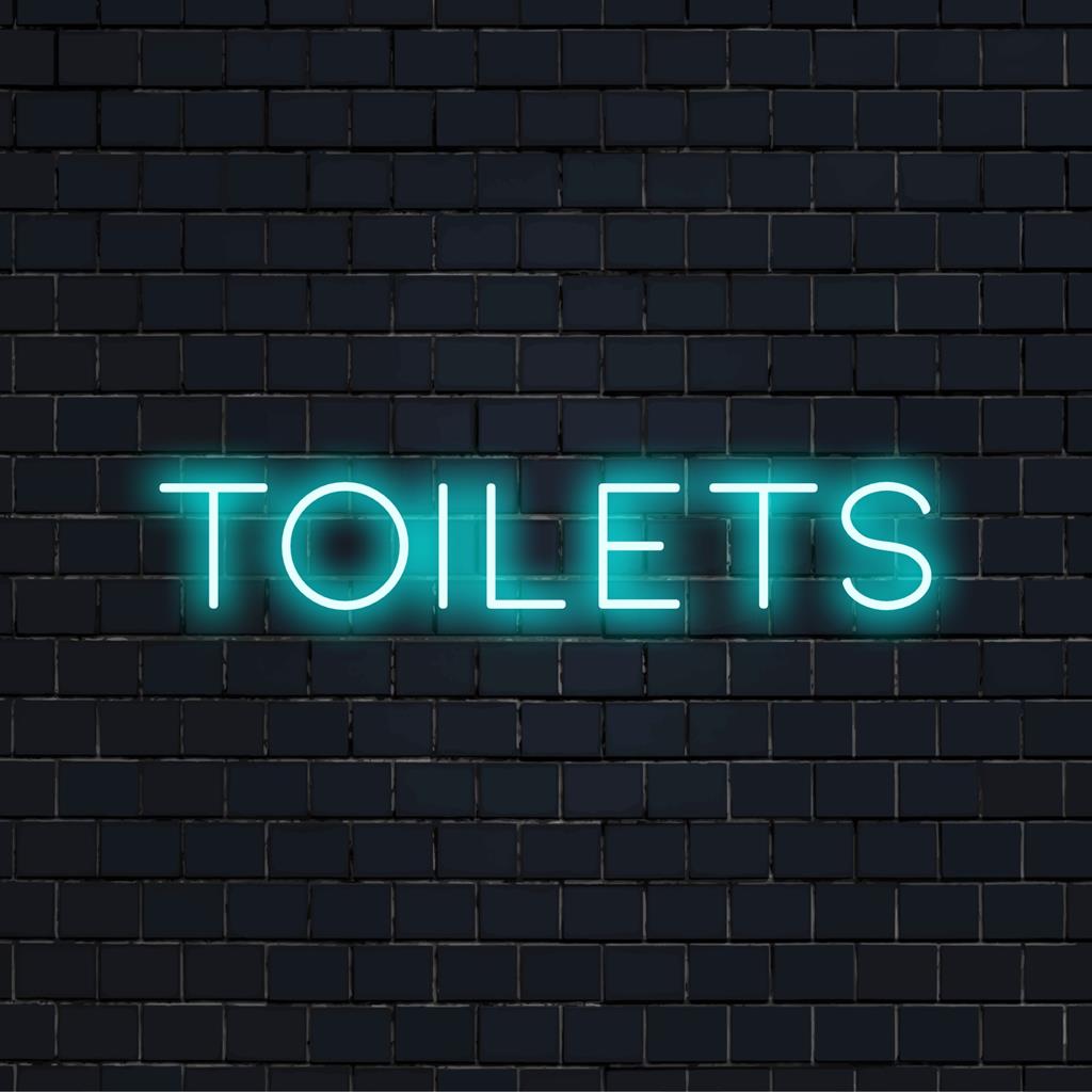Individuelles LED-Neonschild mit dem Wort „Toiletten“ in einer hellen, stilvollen Schriftart; ideal als einzigartiges Neondekor.