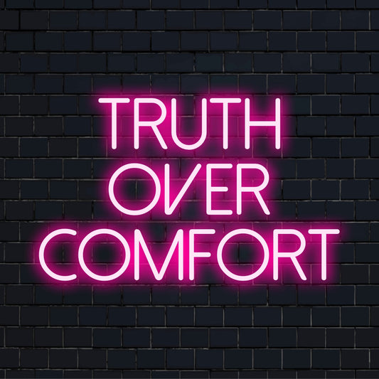LED neon sign with bold white text reading, Truth Over Comfort, showcasing minimalist and sleek neon light decor.