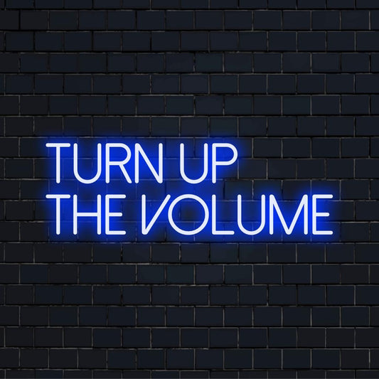 Custom-made LED neon sign reading Turn Up The Volume; perfect blend of vibrant neon art and statement decor.