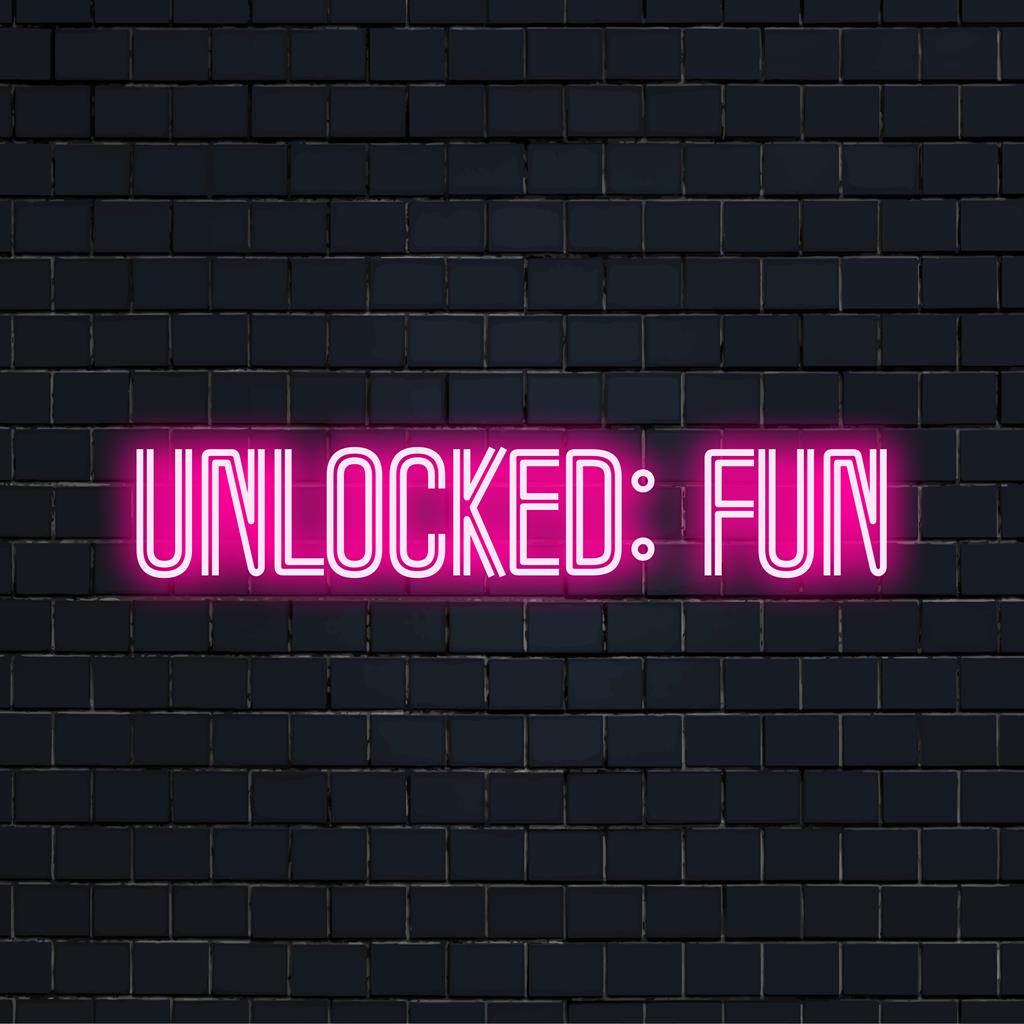 Buntes LED-Neonschild mit der Aufschrift „Unlocked Fun“, das lebendige Energie einfängt und sich perfekt für einzigartige Wandkunst und helle Heimdekoration eignet.