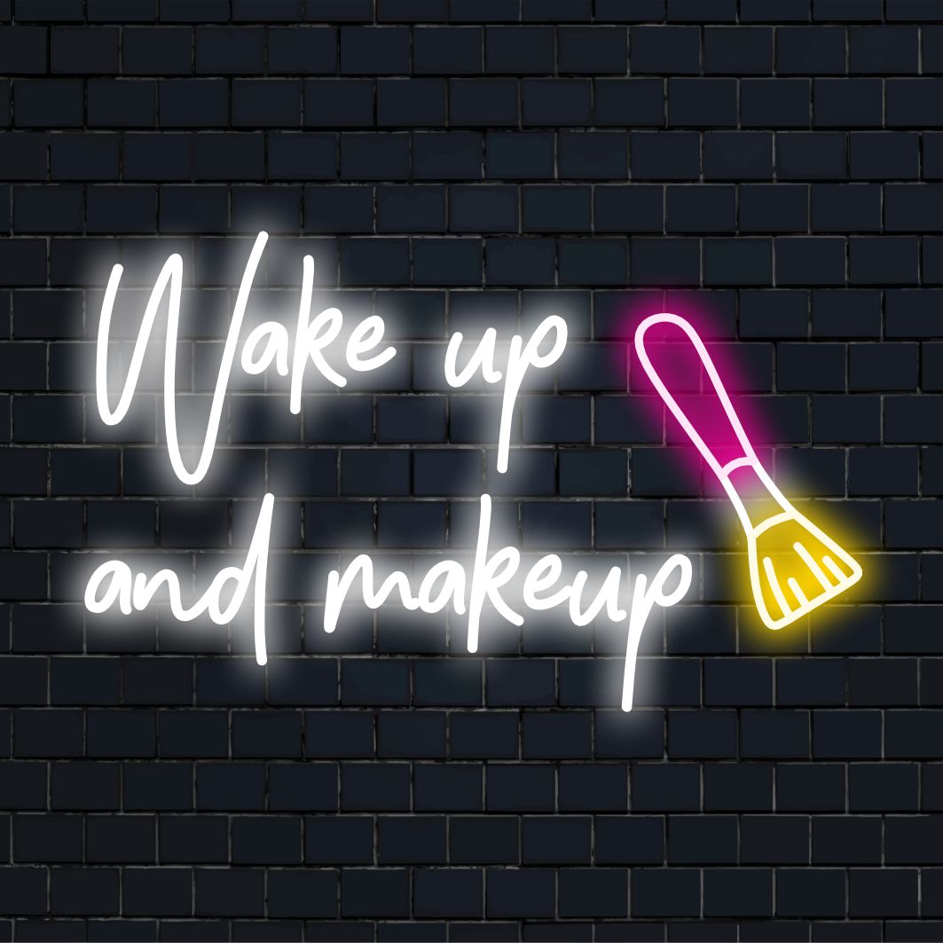 LED neon sign displaying Wake Up And Makeup, perfect for chic decor and morning inspiration. Customizable neon art piece.