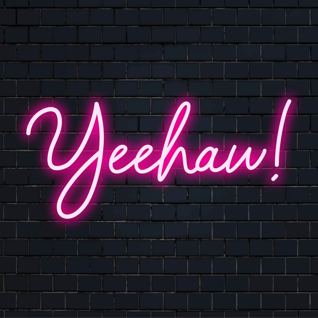 Helles und lebendiges Yeehaw-LED-Neonschild, ein perfektes handgefertigtes Statement-Stück für einzigartige Dekorationen oder festliche Anlässe.