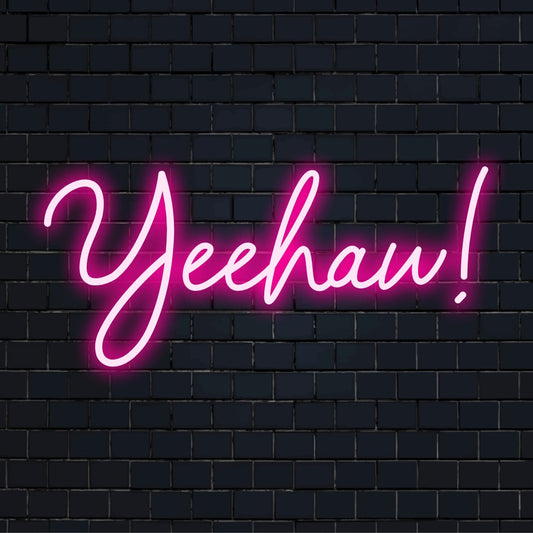 Bright and vibrant Yeehaw LED neon sign, a perfect handmade statement piece for unique decor or celebratory settings.