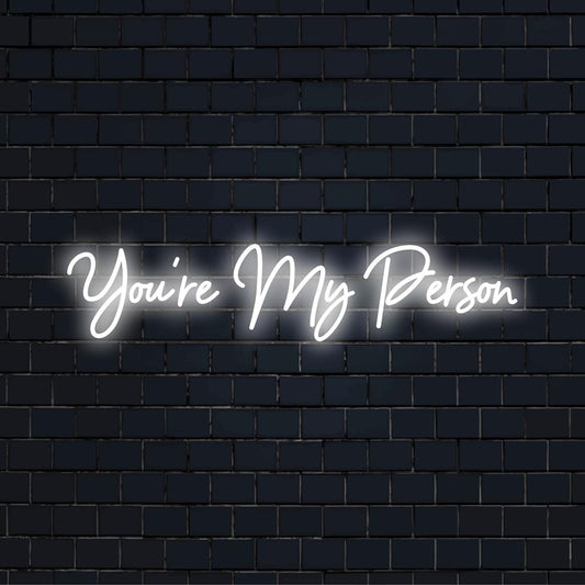 Custom LED neon sign displaying You're My Person, perfect for unique neon wall art or personalized home decor.