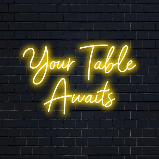 A vibrant Your Table Awaits LED neon sign, perfect for adding a welcoming touch to any dining experience with brilliant glow.