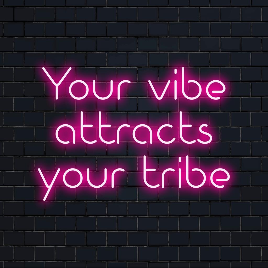Handmade LED neon sign, Your Vibe Attracts Your Tribe, perfect for modern decor or as eye-catching neon wall art.