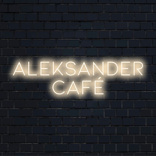 Aleksander Cafe Personalized Neon Light with glowing lettering on black brick background