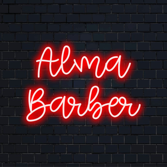 Alma Barber Personalized Neon Light with glowing neon text on dark brick wall