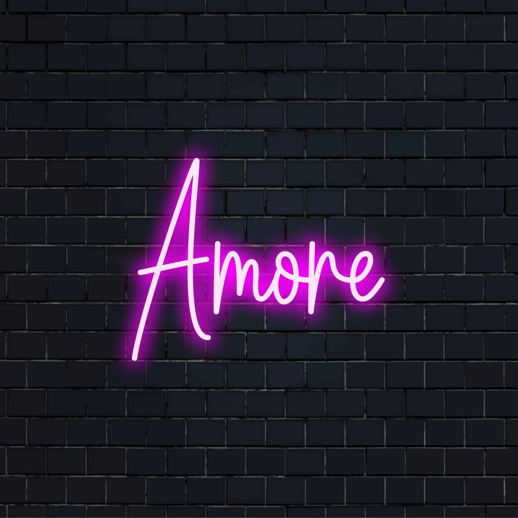 Amore Neon Sign, glowing neon text against black brick wall