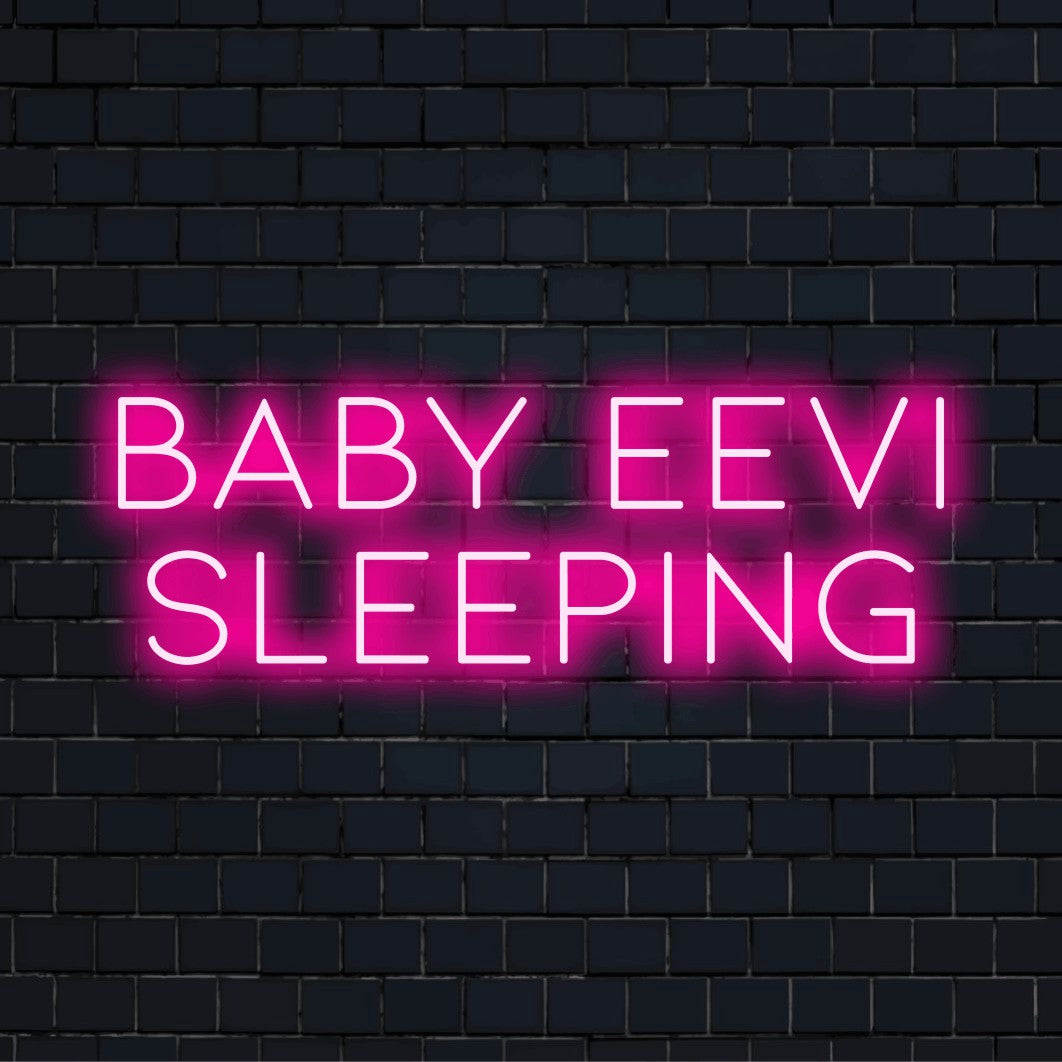 Baby Eevi Sleeping Custom Name Neon Sign, glowing wall decor on dark brick background