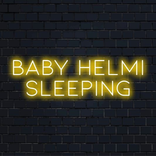 Baby Helmi Sleeping Personalized LED Neon Sign, neon text light against brick backdrop