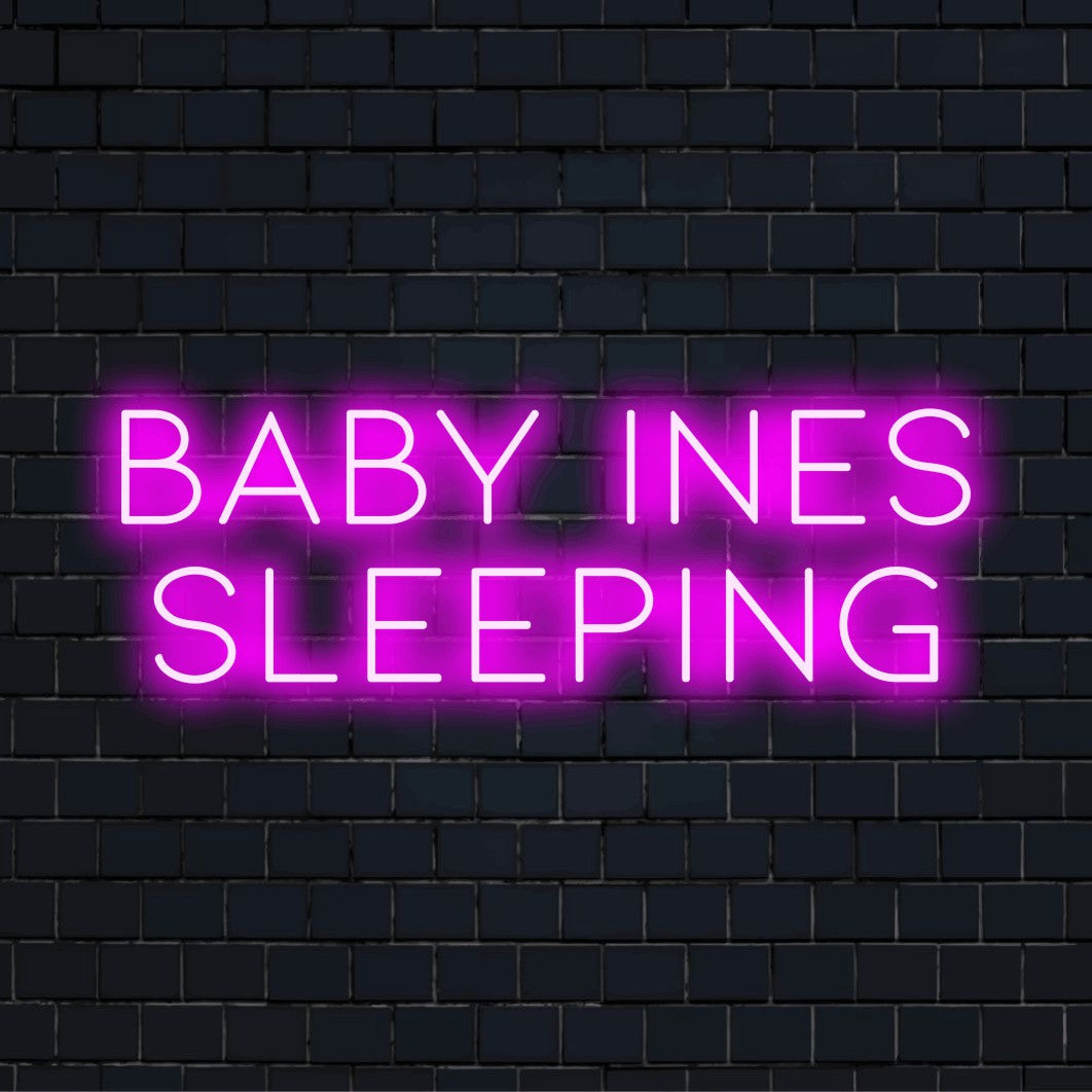 Baby Ines Sleeping Custom Name Neon Sign, neon text light on dark brick wall