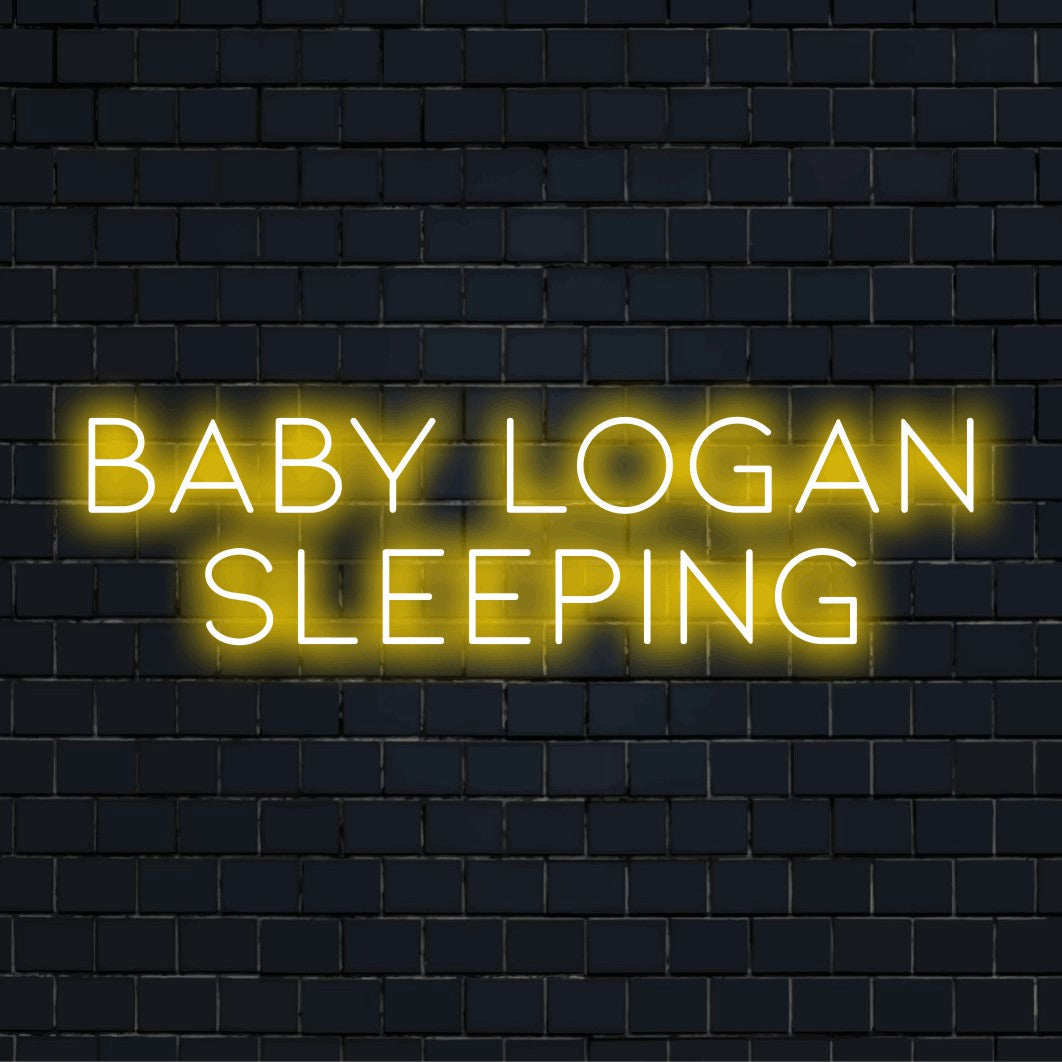Baby Logan Sleeping Custom Name Neon Sign, bright neon lettering on black brick background