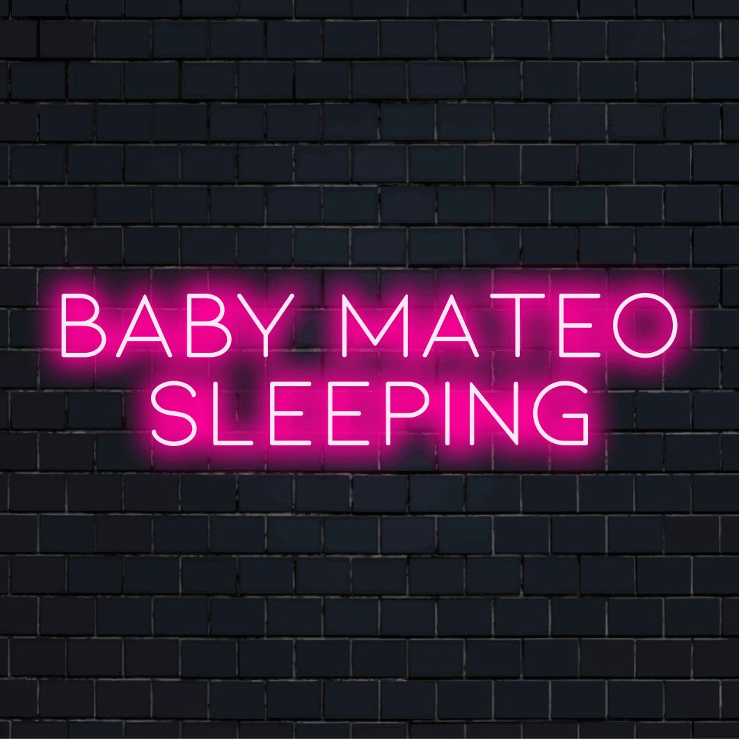 Baby Mateo Sleeping Personalized LED Neon Sign, bright neon glow on dark brick background