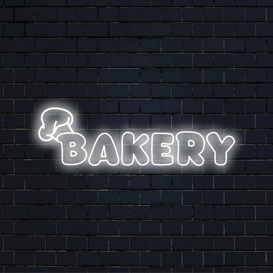 Bakery LED Neon Sign, bright neon lettering on dark brick background