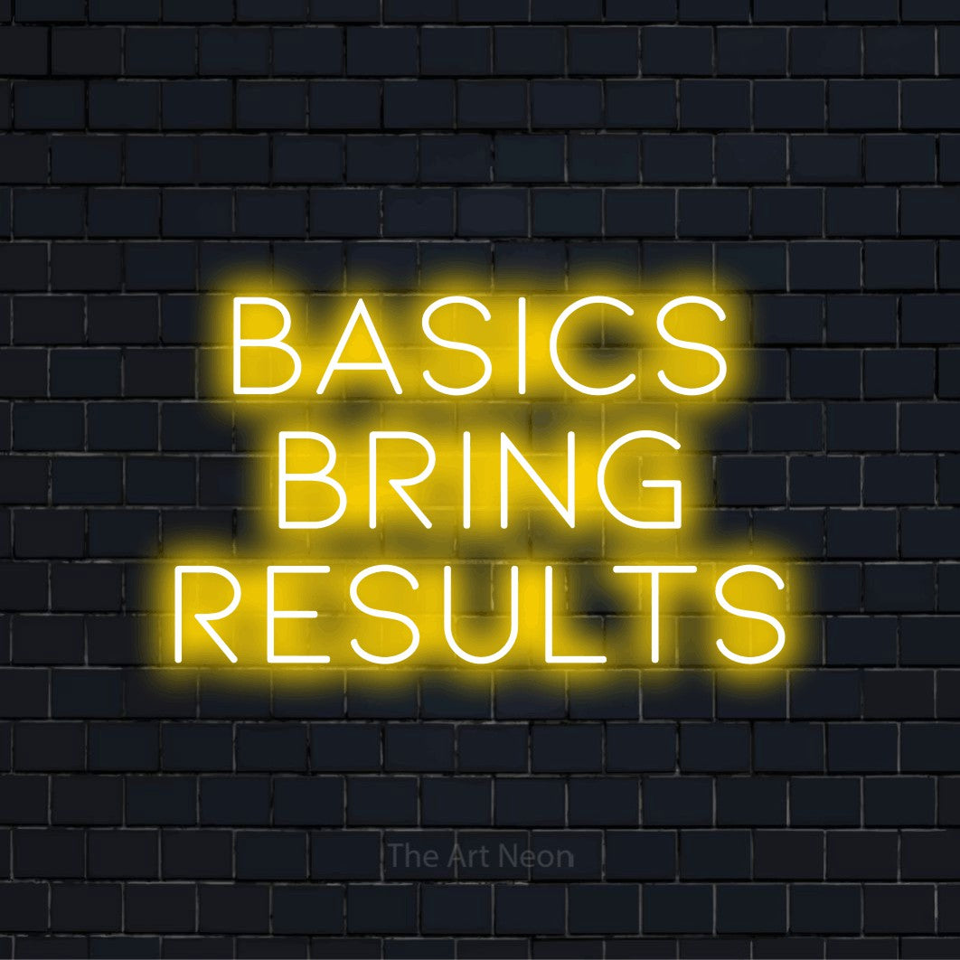 "Basics Bring Results" neon text design on a black brick wall