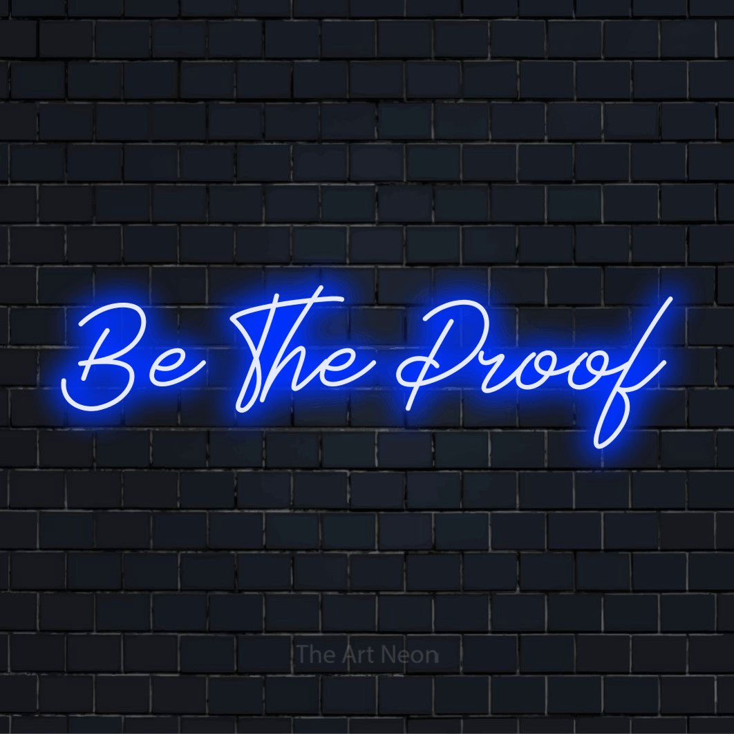 "Be The Proof" LED neon sign on a black brick wall