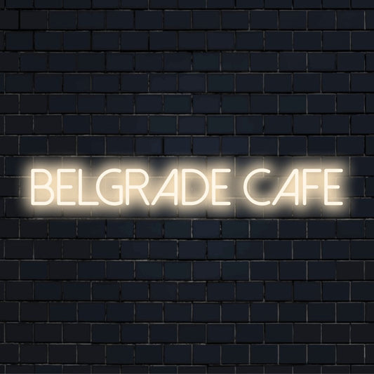 Belgrade Cafe Neon Light with glowing wall decor against black brick wall