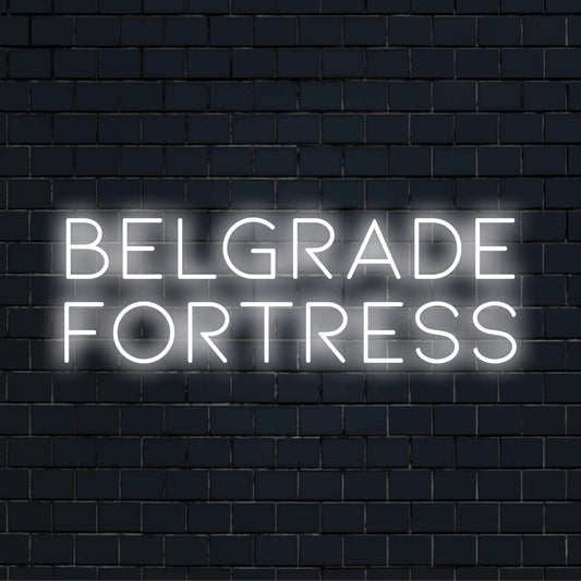 Belgrade Fortress Neon Light with glowing neon text on dark brick background