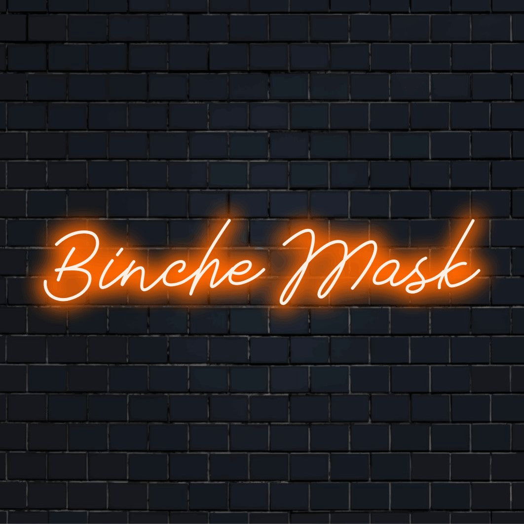 Binche Mask LED Neon Sign, glowing wall decor on dark brick wall