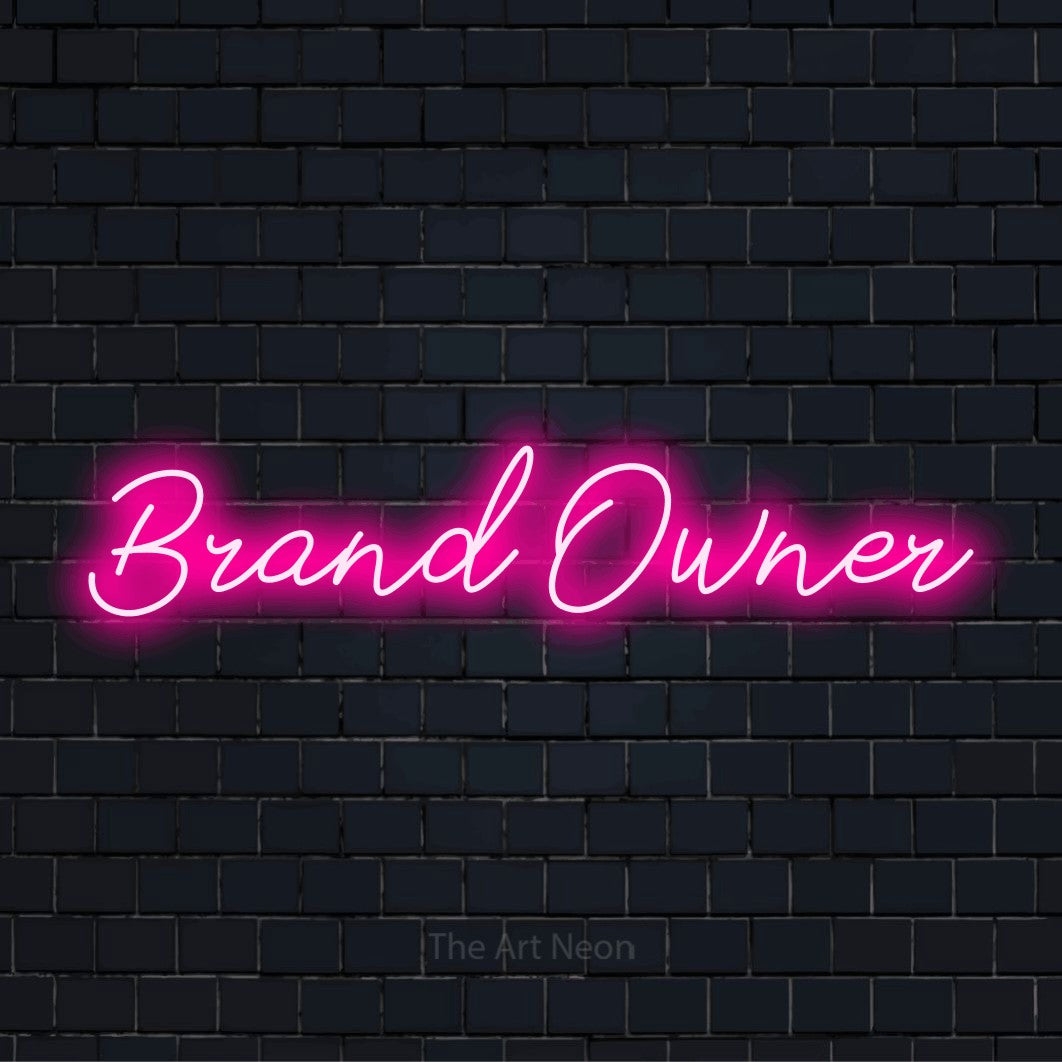 "Brand Owner" glowing LED neon sign on a black brick wall
