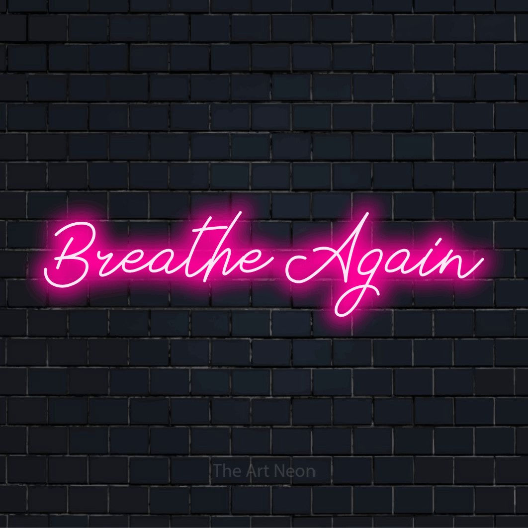 "Breathe Again" neon text design on a black brick wall