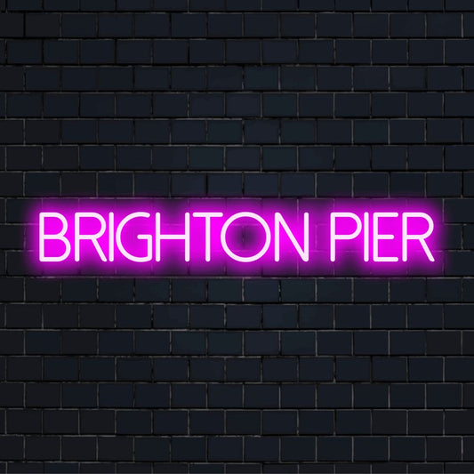 Brighton Pier LED Neon Sign, bright LED glow on dark brick background
