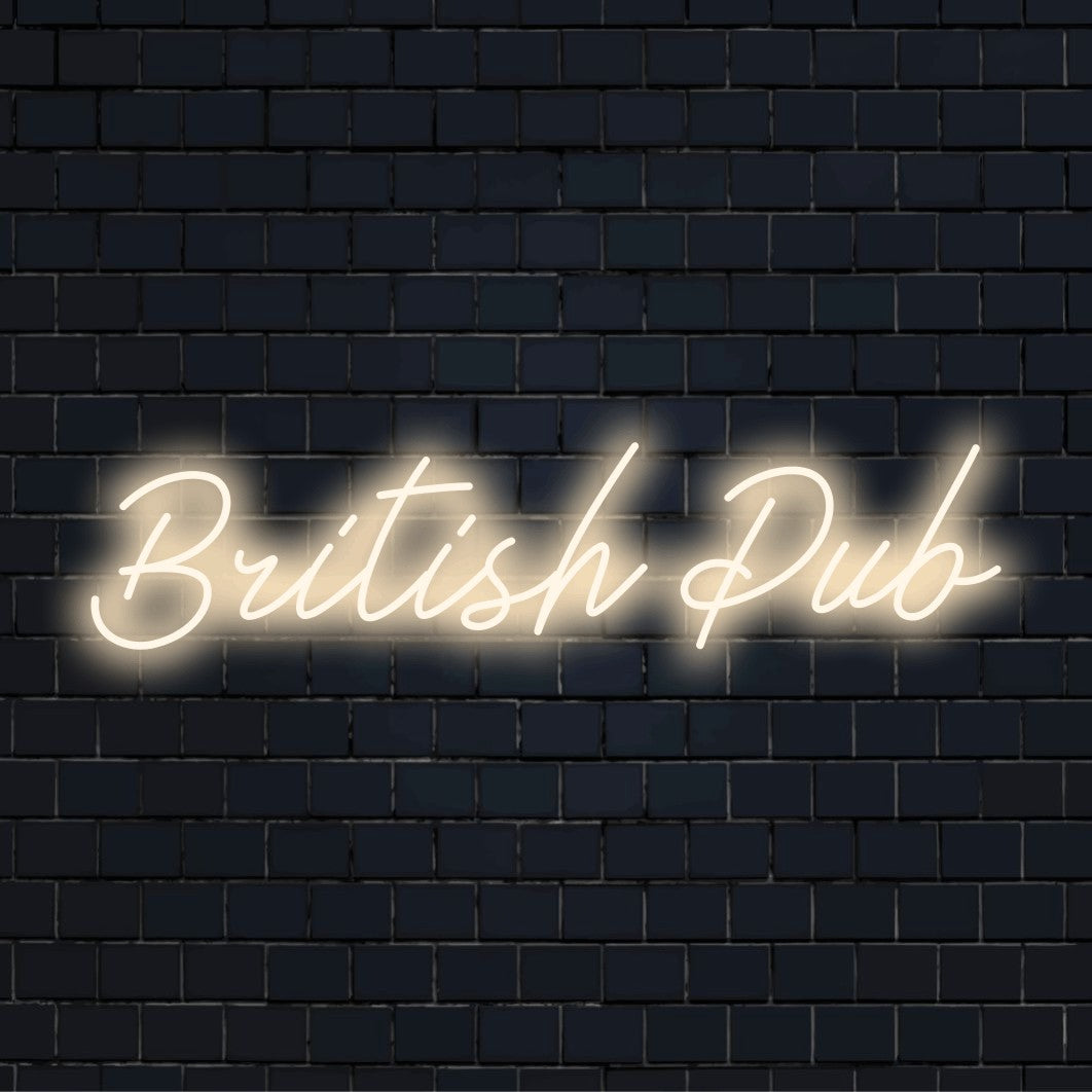 British Pub Neon Sign, bright neon lettering against black brick wall