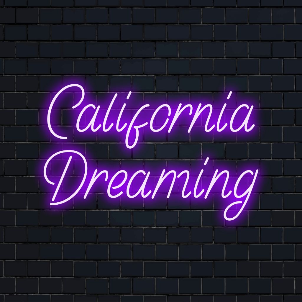 California Dreaming Neon Light with glowing wall decor on dark brick background