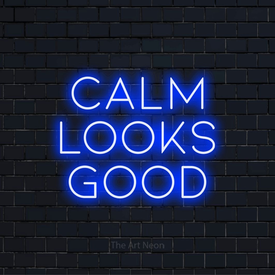 "Calm Looks Good" text design with neon effect on a black brick wall