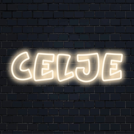 Celje Neon Light with bright LED glow against brick backdrop