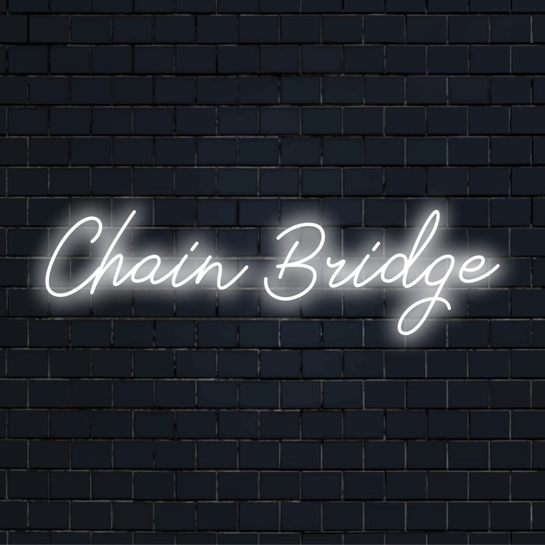 Chain Bridge Neon Sign, soft neon glow against brick backdrop