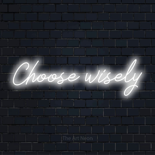 "Choose Wisely" glowing LED neon sign on a black brick wall