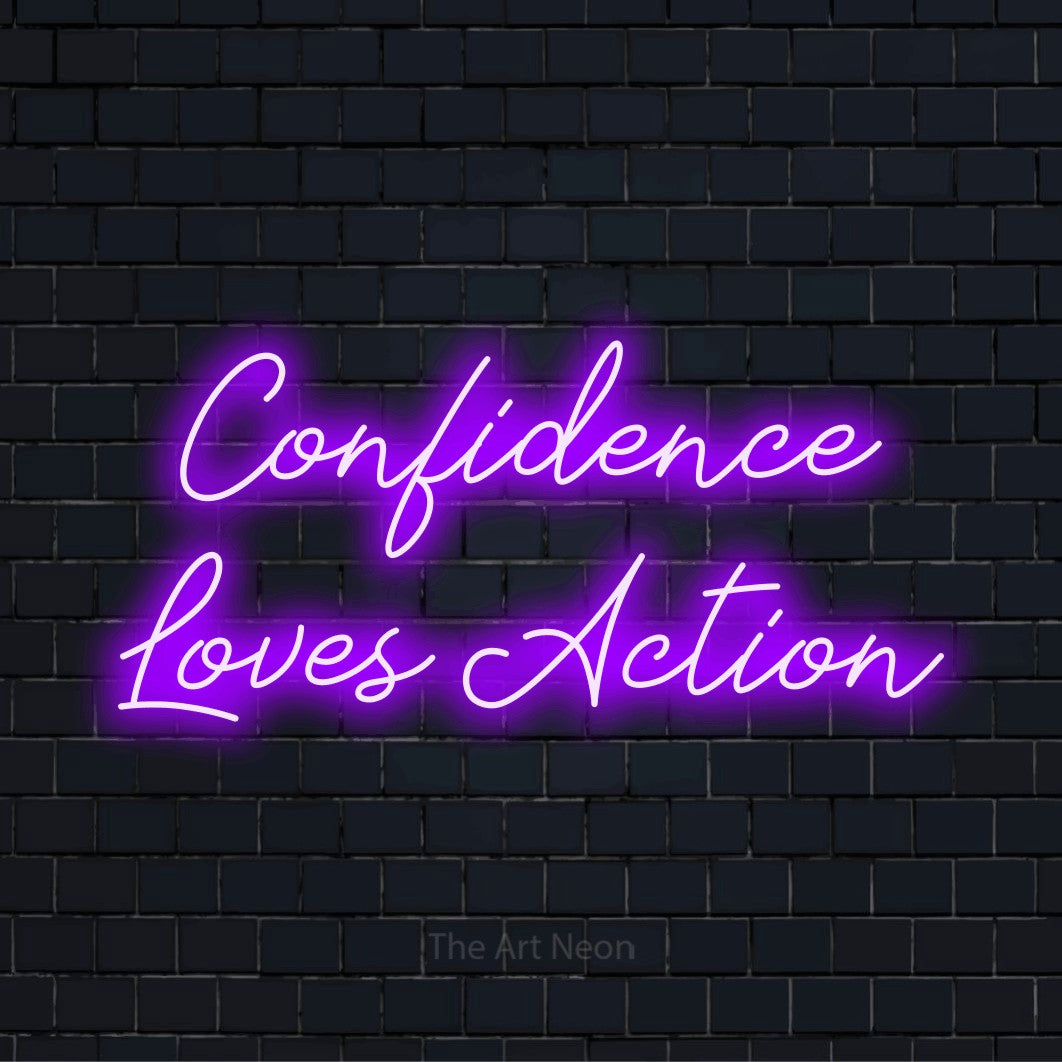 "Confidence Loves Action" script-style LED neon sign on a black brick wall